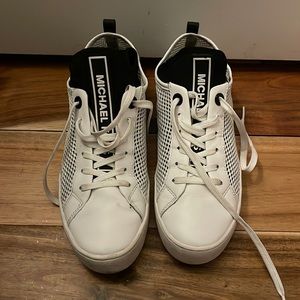 Michael Kors knit sneakers with a neoprene like insert. In excellent condition.
